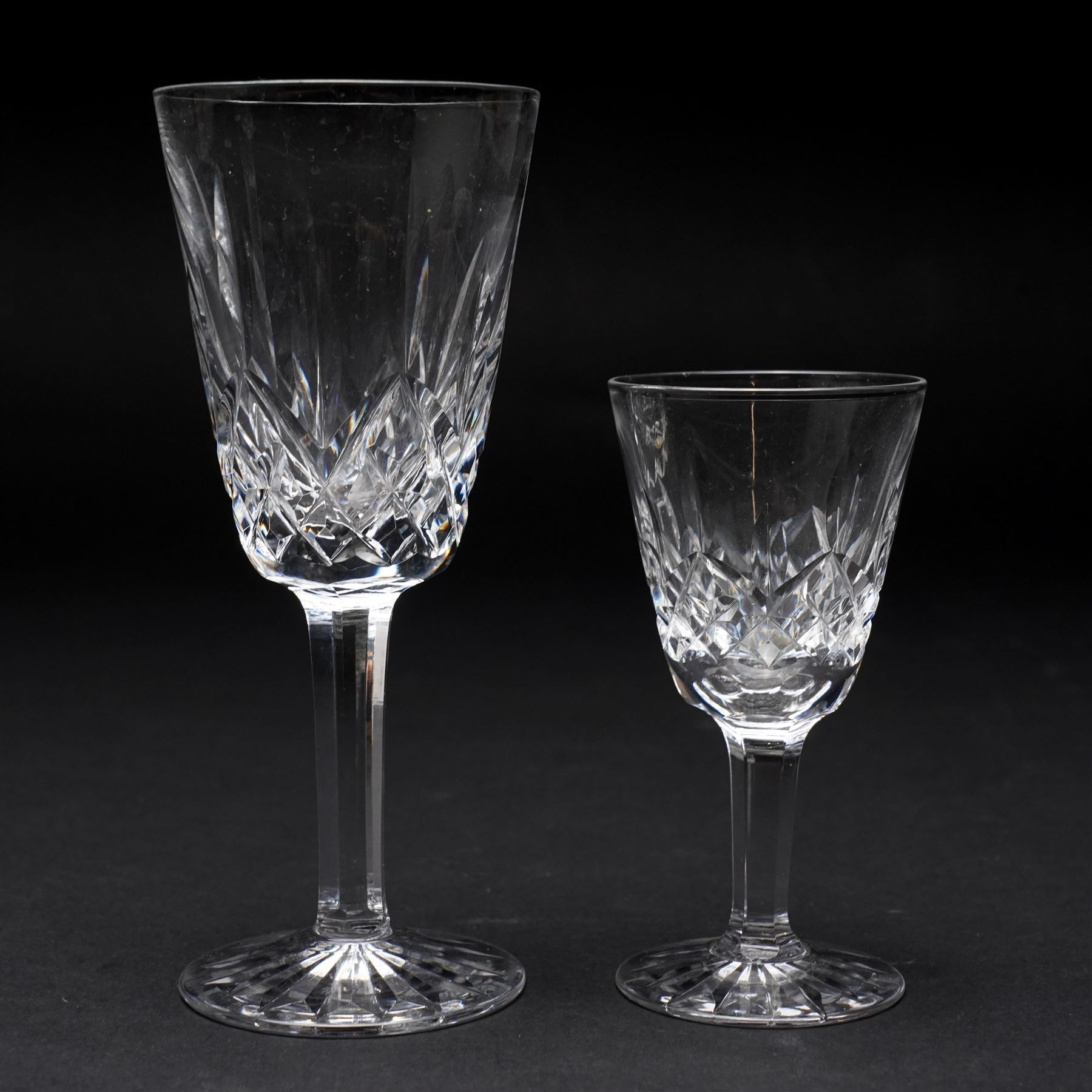 Waterford 'Lismore' pattern part suite, comprising three small tumblers, six liqueur glasses, twelve sherry glasses, eight large wine glasses and three smaller examples