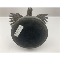Bronze eagle, modelled in a standing position with wings spread, raised on a black veined marble circular plinth base, H29cm