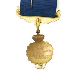 Early 20th century Royal Antediluvian Order of Buffaloes (RAOB) 9ct gold enamel jewel presented to Bro. W. Flood by the Earl of Essex Lodge and another in gilt metal and enamel marked Hull Convention 1906 (2)