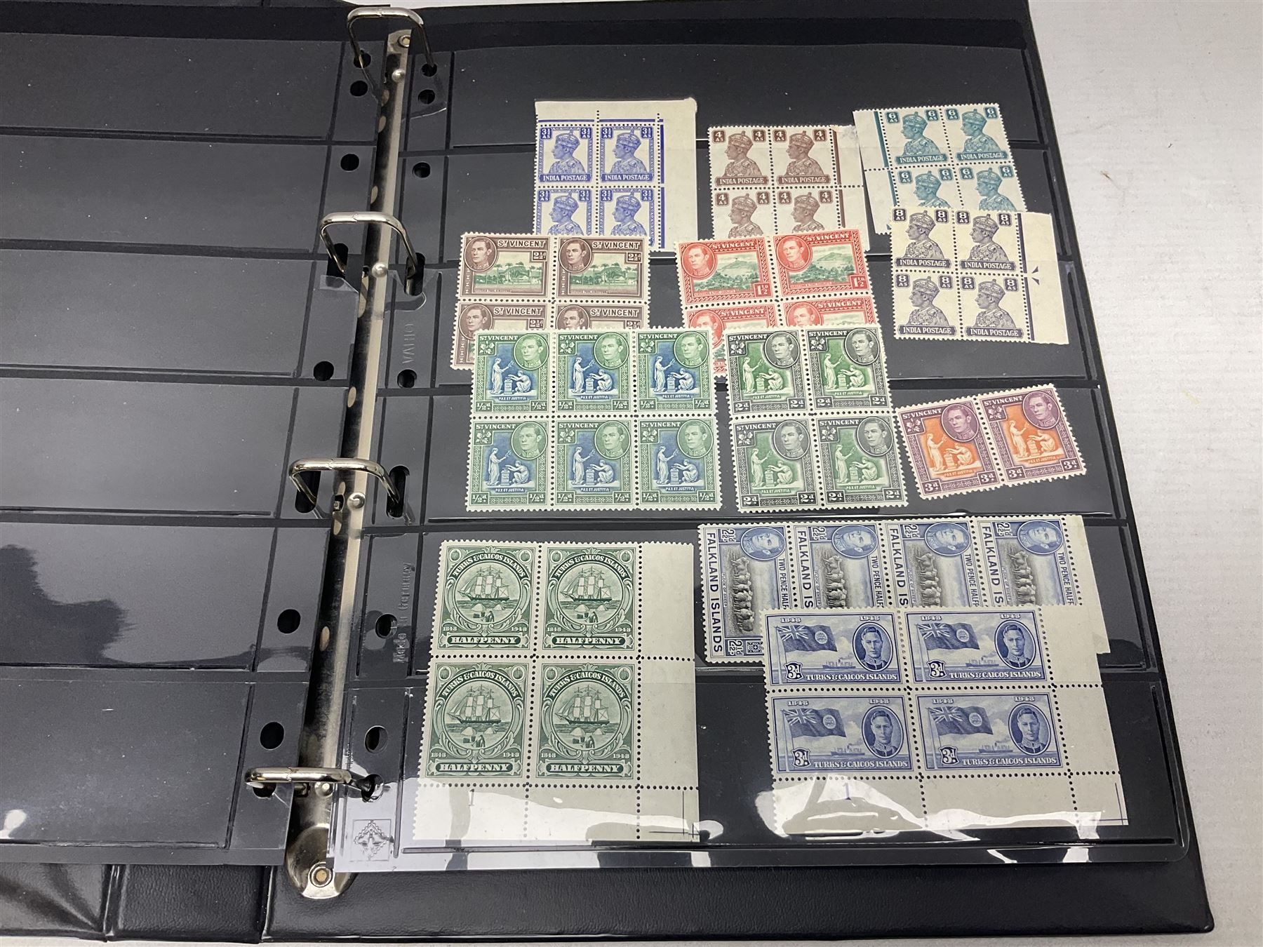 Stamps including various King George VI 12th May 1937 coronation, various 8th June 1946 Victory, various 1923-1948 Silver Wedding, Turks and Caicos Islands 'Raking Salt' mint marginal blocks of four etc, housed in two ring binder folders