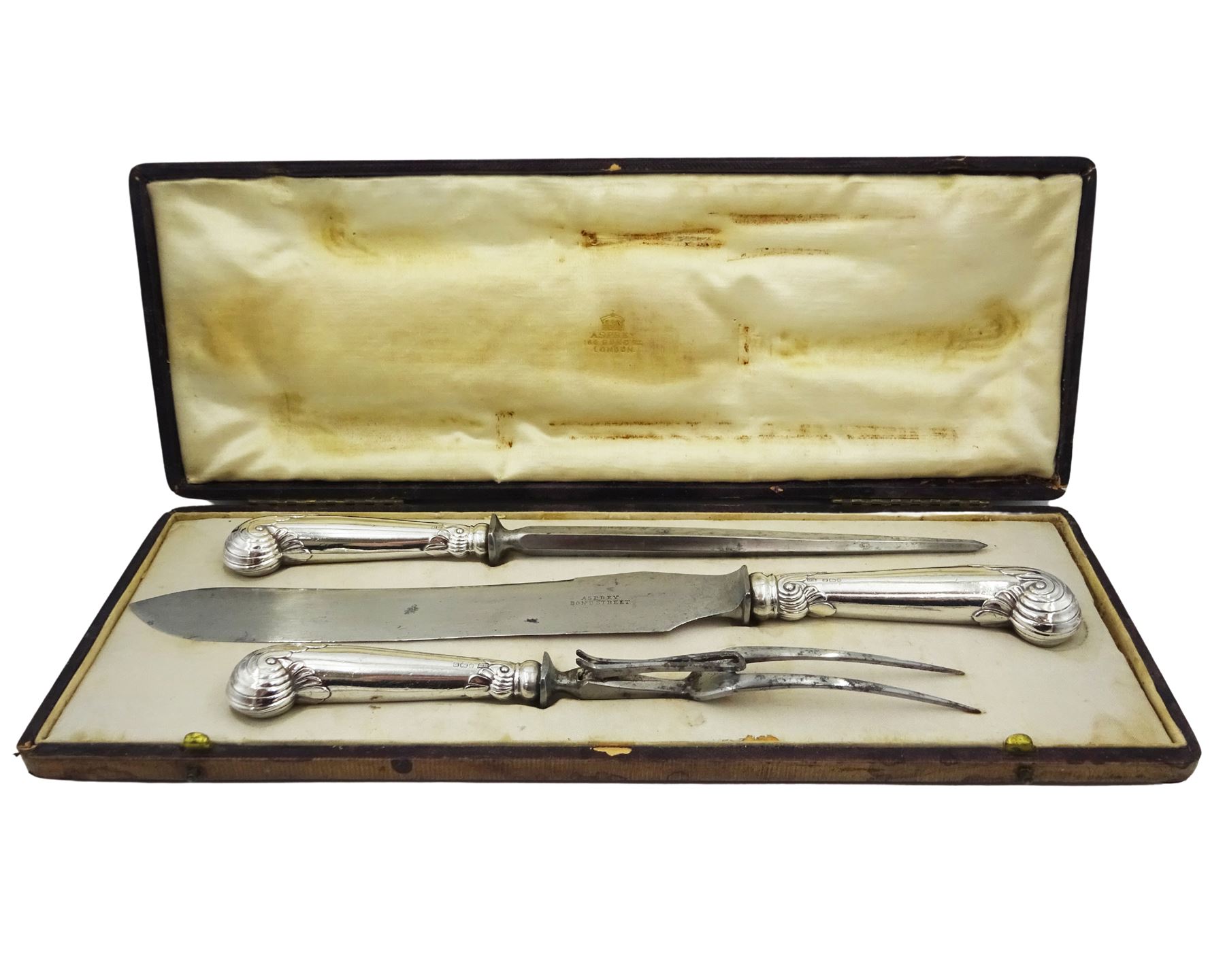 Edwardian silver handled three piece carving set, the knife blade stamped Asprey Bond Street, hallmarked Harrison Brothers & Howson, Sheffield 1903, contained within a fitted case, the interior silk lining marked Asprey 166 Bond St London 