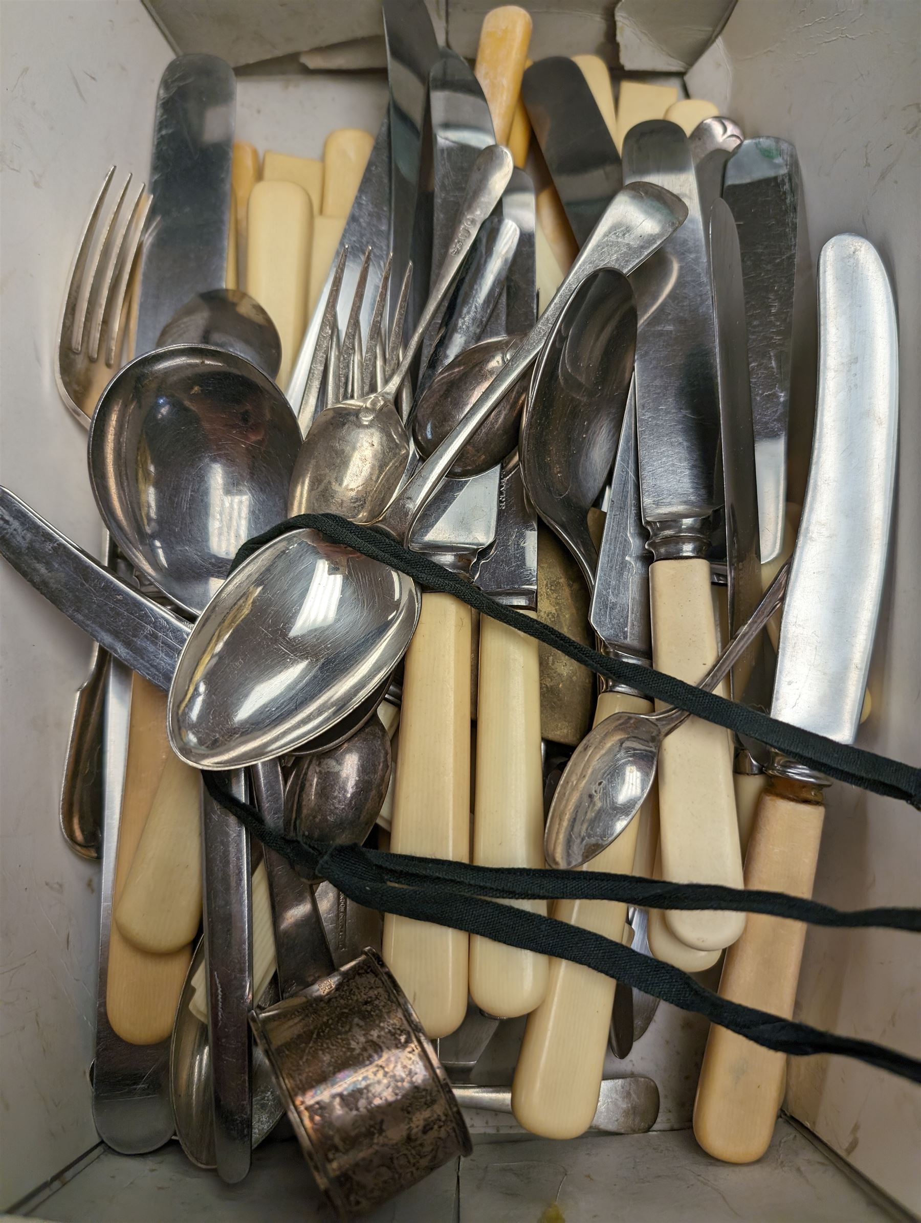 Silver napkin ring and a silver teaspoon, hallmarked, together with a quantity of stainless steel ivorine handled knives and other flatware