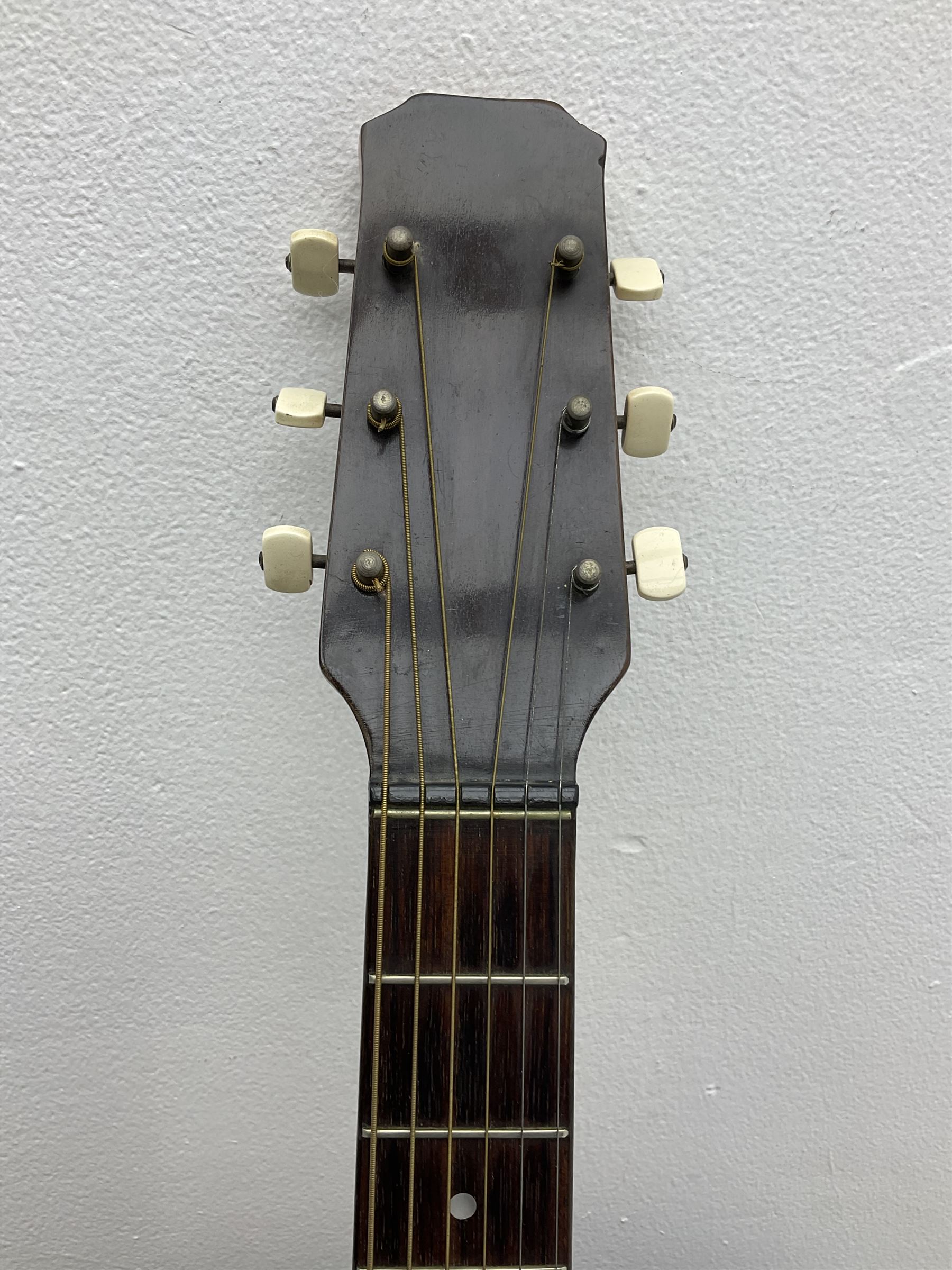 1950s acoustic guitar with f-holes and pickguard L105cm; black fur lined hard carrying case