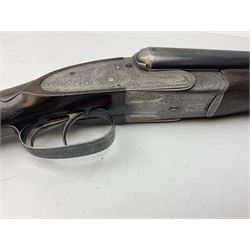 Smith Midgley Bradford 12-bore side-by-side double barrel side-lock ejector shotgun with 71cm barrels, engraved action with patented top lever, ivy leaf fences and top safety, walnut stock with chequered grip and fore-end, serial no.62409 to barrels and 1481 to action, L115cm overall SHOTGUN CERTIFICATE REQUIRED