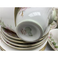 Royal Doulton Apple Blossom pattern tea service for twelve, comprising twelve saucers, twelve tea plates, twelve teacups, milk jug, sucrier and two cake plates