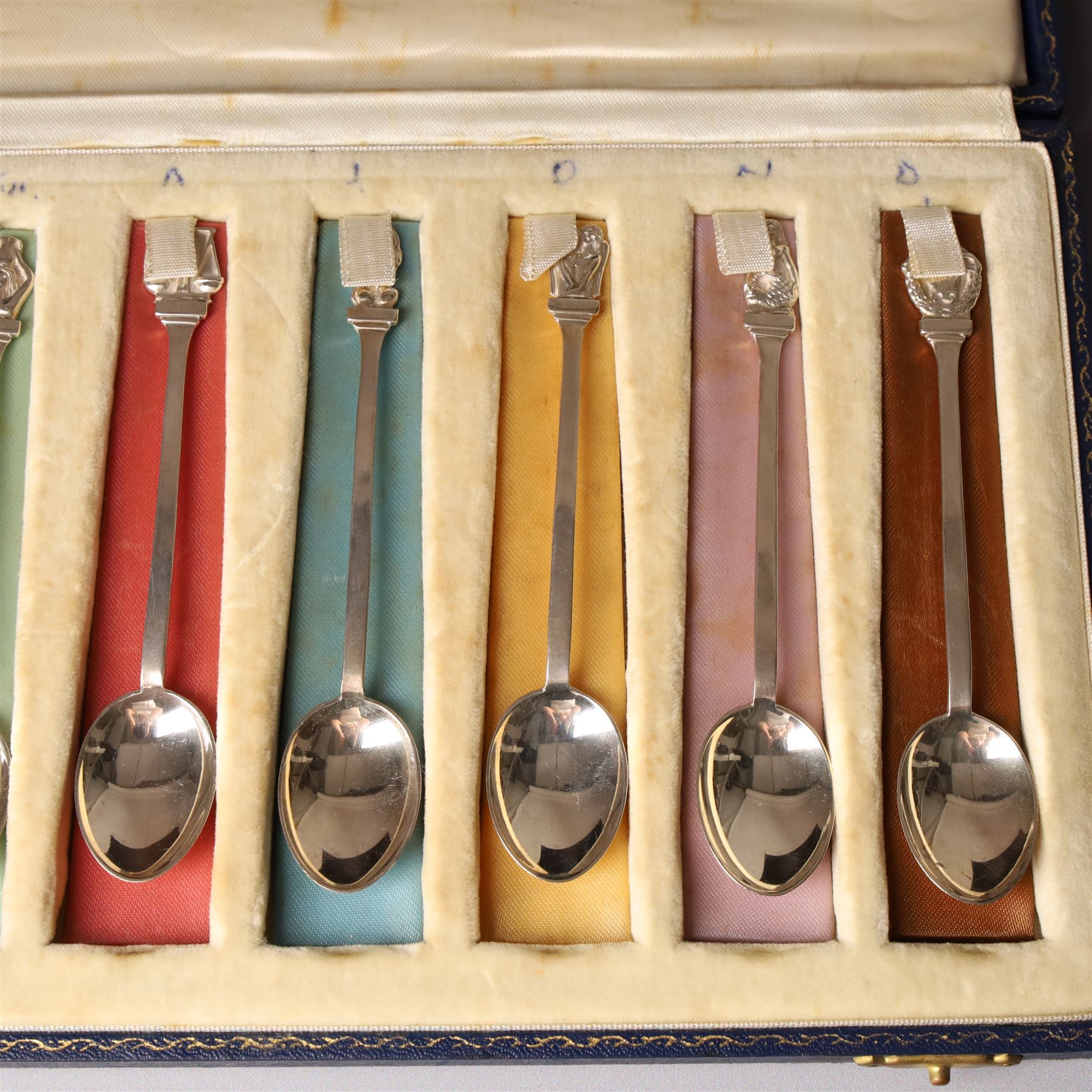 Cased set of silver Signs of the Zodiac spoons each with a different terminal L11cm London 1964 Maker Joseph Gloster Ltd