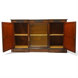 Lamb of Manchester (est. 1843) - Victorian Aesthetic Movement inlaid figured and burr walnut inverted-breakfront credenza, the shaped rectangular top with ebony banding and boxwood stringing, the frieze applied with bronze mounts decorated with foliate and scroll motifs, fitted with central glazed door flanked by panelled doors with central oval metal plaques depicting Classical Muses with lyre, the flanking canted uprights applied with caryatid maidens holding torches, acanthus terminal over skirted base