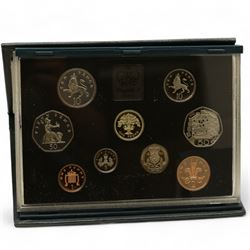 Great British and World coins, including six The Royal Mint United Kingdom proof coin collections, dated 1984, 1986, 1992, 1994, 1997, 1998 cased with certificates, 1990 '90th Birthday' silver proof crown, various pre 1947 silver coins, other pre-decimal coinage, Bhutan 1979 silver proof three ngultrum, Maria Theresa restrike silver thaler, two United States of America 1964 Kennedy half dollars etc and various banknotes with The Royal Bank of Scotland one pound 3rd January 1967, United States of America one dollar note series 1963 A etc