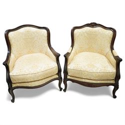 Pair of French design upholstered armchairs, with shaped crested backs and scroll arm supp...