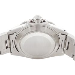 Rolex Oyster Perpetual Submariner Date stainless steel  automatic wristwatch, Ref. 16610, Serial No. L438272, black dial with luminous filled dot hour markers, baton quarters, white outer minute divisions, magnified date aperture at 3, polished Mercedes hands with luminous inserts, on Oyster stainless steel bracelet, with fold-over clasp