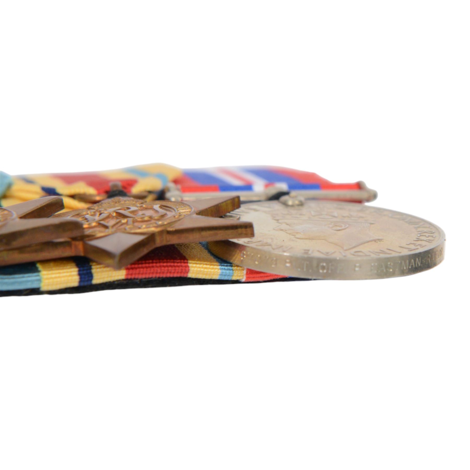 WWII trio, War medal, 1939-45 star and Atlantic star, awarded to Albert Harris R.N, together with WWII trio, War medal, 1939-45 star and The African Star, awarded to Pilot Officer P Eastman and another war and defence medal     