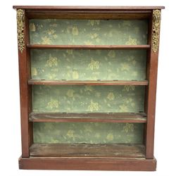 Early 20th century mahogany open bookcase, fitted with three shelves on plinth base, decorated with foliate patterned gilt metal mounts