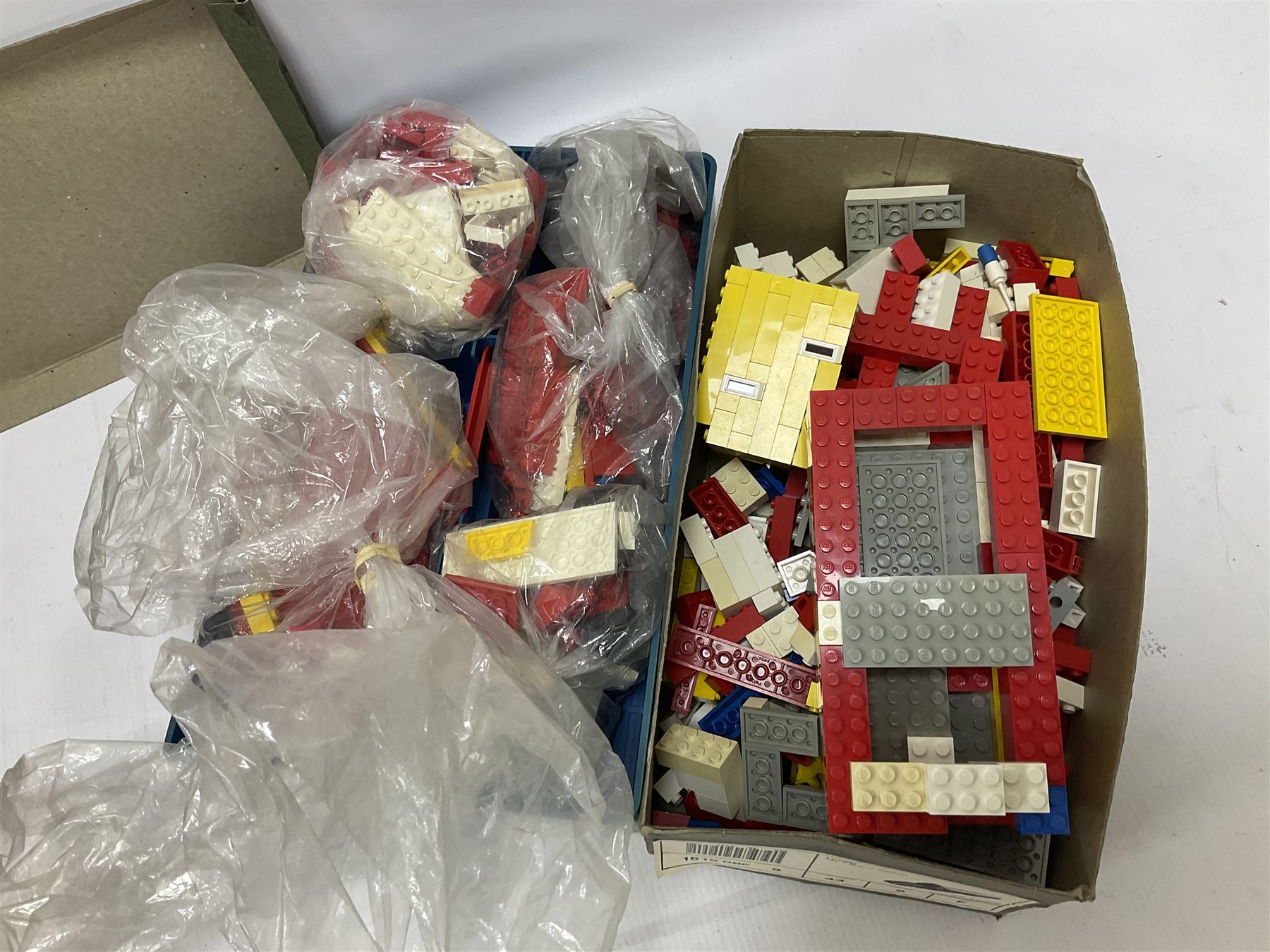 Fischer Technik/Lego/Playmobil - thirteen model building sets comprising eight Fischer Technik sets 50, 50/1, 50v, 50/2, 50+mot1 and two 50S, 50/1 add-on pack, with spare parts packs 01, 03, 05, two 22 and 30; two Lego sets comprising C107 and Lego Systems 103, part-set 870 and 970; Playmobil no.3520 set; four boxes of loose lego, various instruction manuals and a scrapbook 