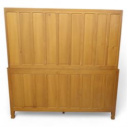 David 'Oakleafman' Langstaff - oak three drawer dresser, the scalloped cornice above a back with central open shelves flanked by two glazed and leaded cupboard doors opening to glass shelves, upon a base with adzed top carved with signature leaf, three drawers and three panelled cupboard doors with turned handles, upon octagonal feet, from the workshop of David Langstaff, Easingwold, Yorkshire