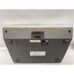 Four 1970s Sinclair electronic calculators - Cambridge in hard case with booklet; Scientific Programmable with Program Library and booklet; Scientific in hard case; and Oxford 300 in soft case with booklet; together with Texas PC-100 SR56 programmable slide-rule calculator on base station with readout, two booklets, keys and cover, serial no.9103093