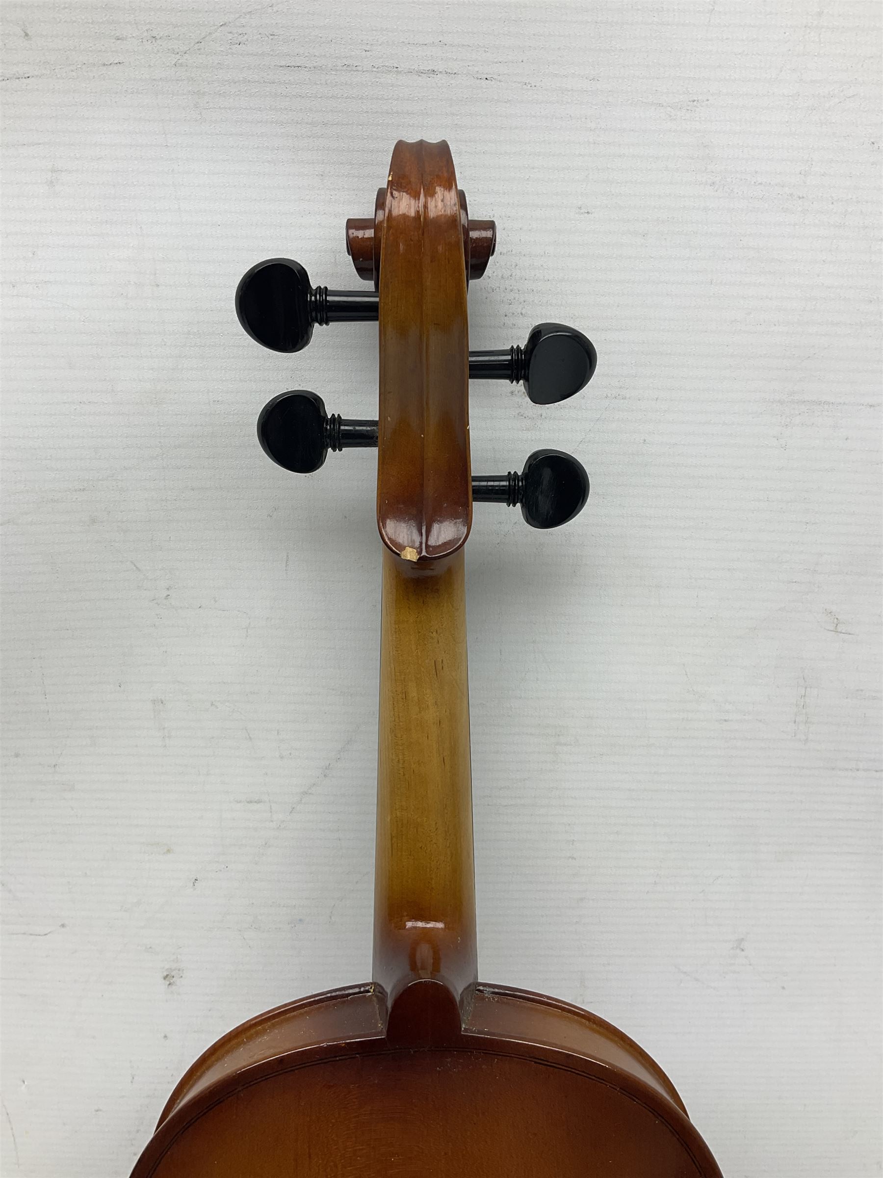 Chinese Parrot violin with 35.5cm two-piece back; L59.5cm in carrying case; and early 20th century German violin for restoration; bears label 'Antonius Stradivarius Faciebat Anno 1730'; cased with bow (2)