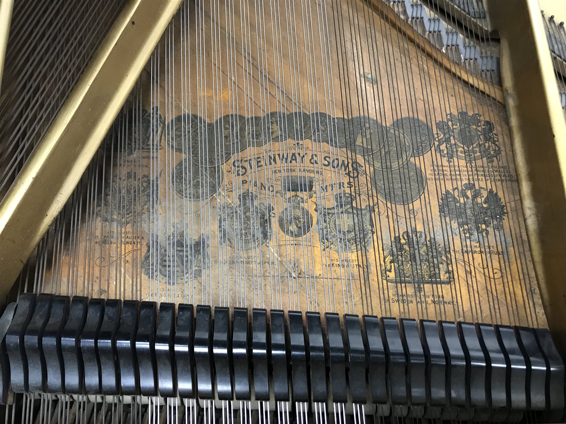 Steinway & Sons - Victorian rosewood cased grand piano, model 'O', iron framed and overstrung, serial no. '93958', circa. 1897, pierced scrolling music rest, turned and fluted supports with recessed castors, L187cm, W143cm, H99cm 