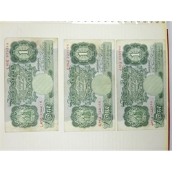  Collection of forty-nine Great British banknotes including three O'Brien series A ten shilling notes, three Beale one pound notes prefix 'L05C', 'C78J' and 'J35J, six page one pound notes, twelve Somerset one pound notes, O'Brien series B five pound note prefix 'H06', eight Page five pound notes all prefix '60E', various Scottish banknotes etc, in red album, face value over one hundred and twenty pounds  