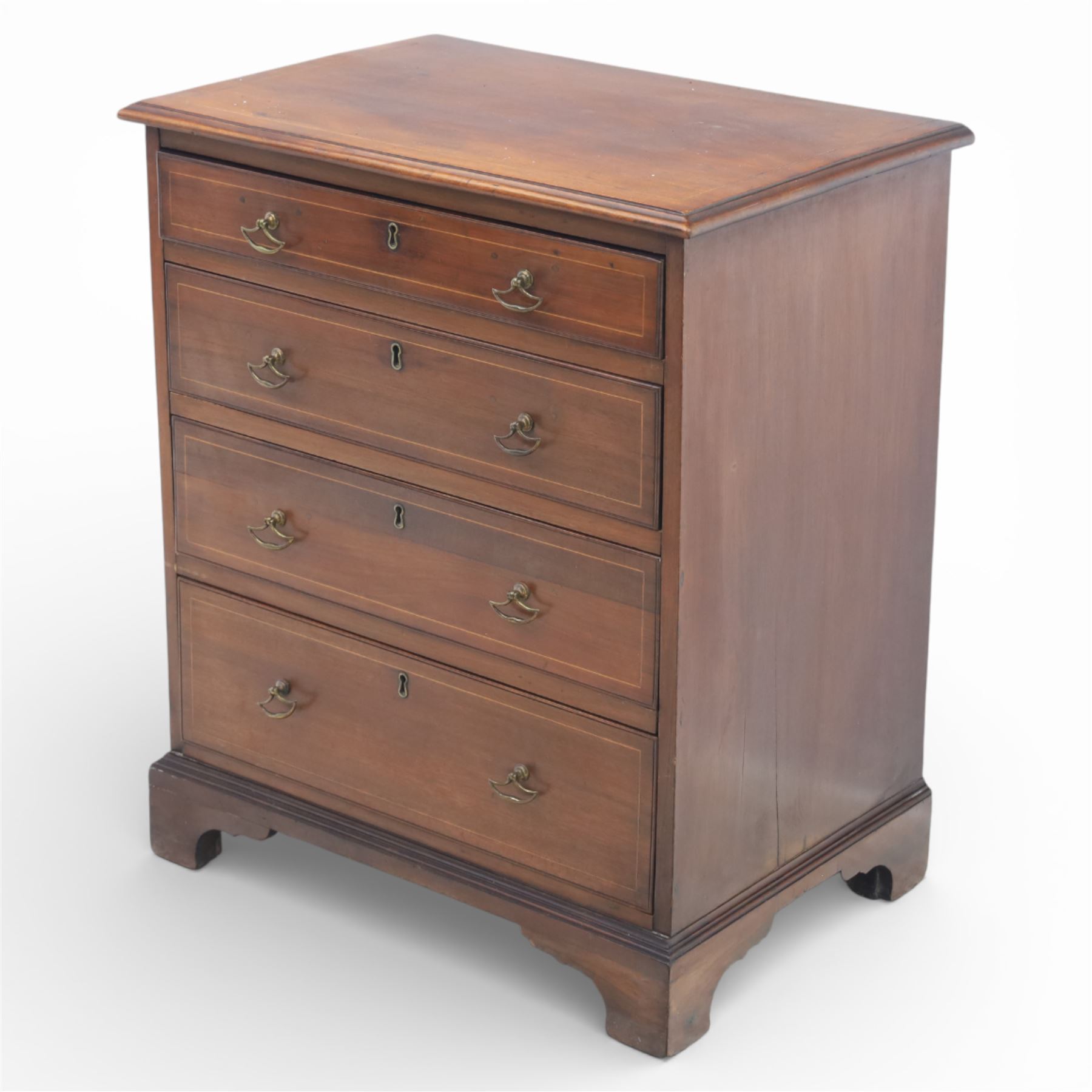 Edwardian mahogany bachelor chest with inlay, the rectangular crossbanded top with fine stringing over a graduated arrangement of four drawers fitted with brass swan neck handles, standing on a moulded plinth above bracket feet