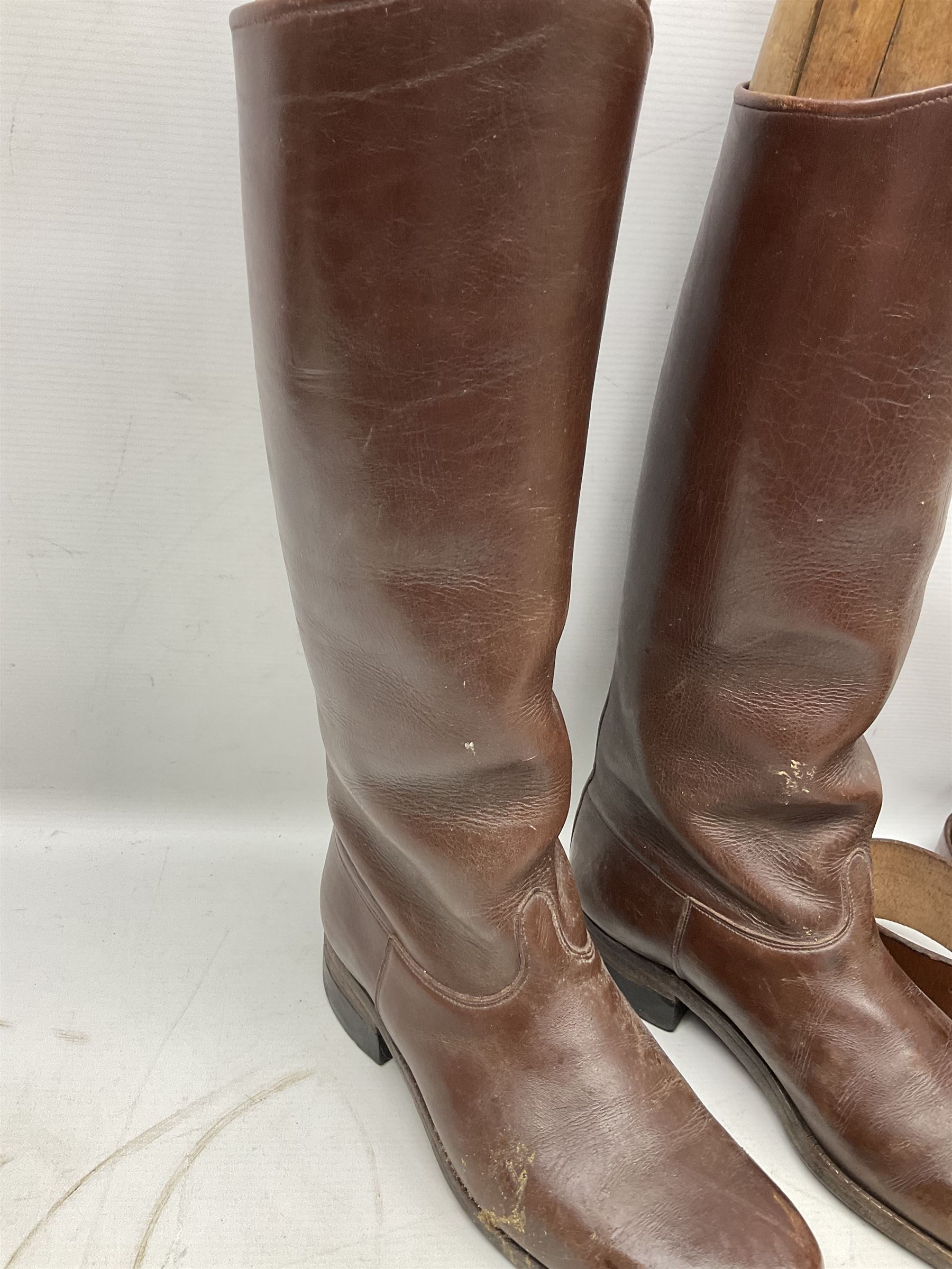 Pair of WW1 style Army Officer's brown leather full leg riding boots with Alkit four-piece wooden boot trees; and two officer's Sam Browne leather belts with cross-straps, one with sword frog (4)