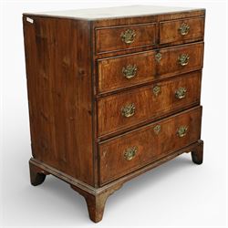 Georgian mahogany chest of drawers, the rectangular top above two short drawers over three long graduated drawers, each with brass swan neck handles and escutcheons, raised on shaped bracket feet