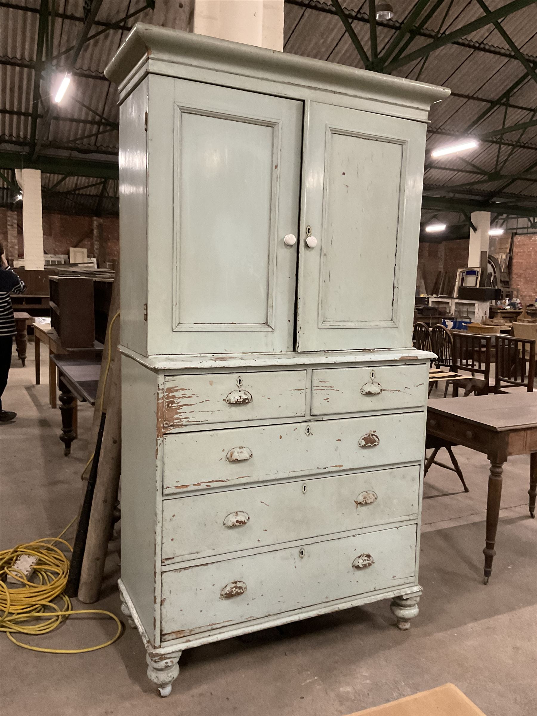 19th century pale blue painted pine housekeepers cupboard, double panelled cupboard enclosing two shelves over two short and three long drawers, on turned feet - THIS LOT IS TO BE COLLECTED BY APPOINTMENT FROM THE OLD BUFFER DEPOT, MELBOURNE PLACE, SOWERBY, THIRSK, YO7 1QY