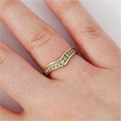 9ct gold diamond wishbone ring, channel set with thirteen round brilliant cut diamonds, hallmarked