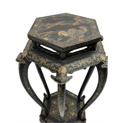 Chinese black lacquer jardinière stand, the hexagonal top painted with traditional landscape scenes within a gilt strung border, the pierced frieze with trailing foliate decoration and geometric patterns, supported on six cabriole supports united by a raised hexagonal base