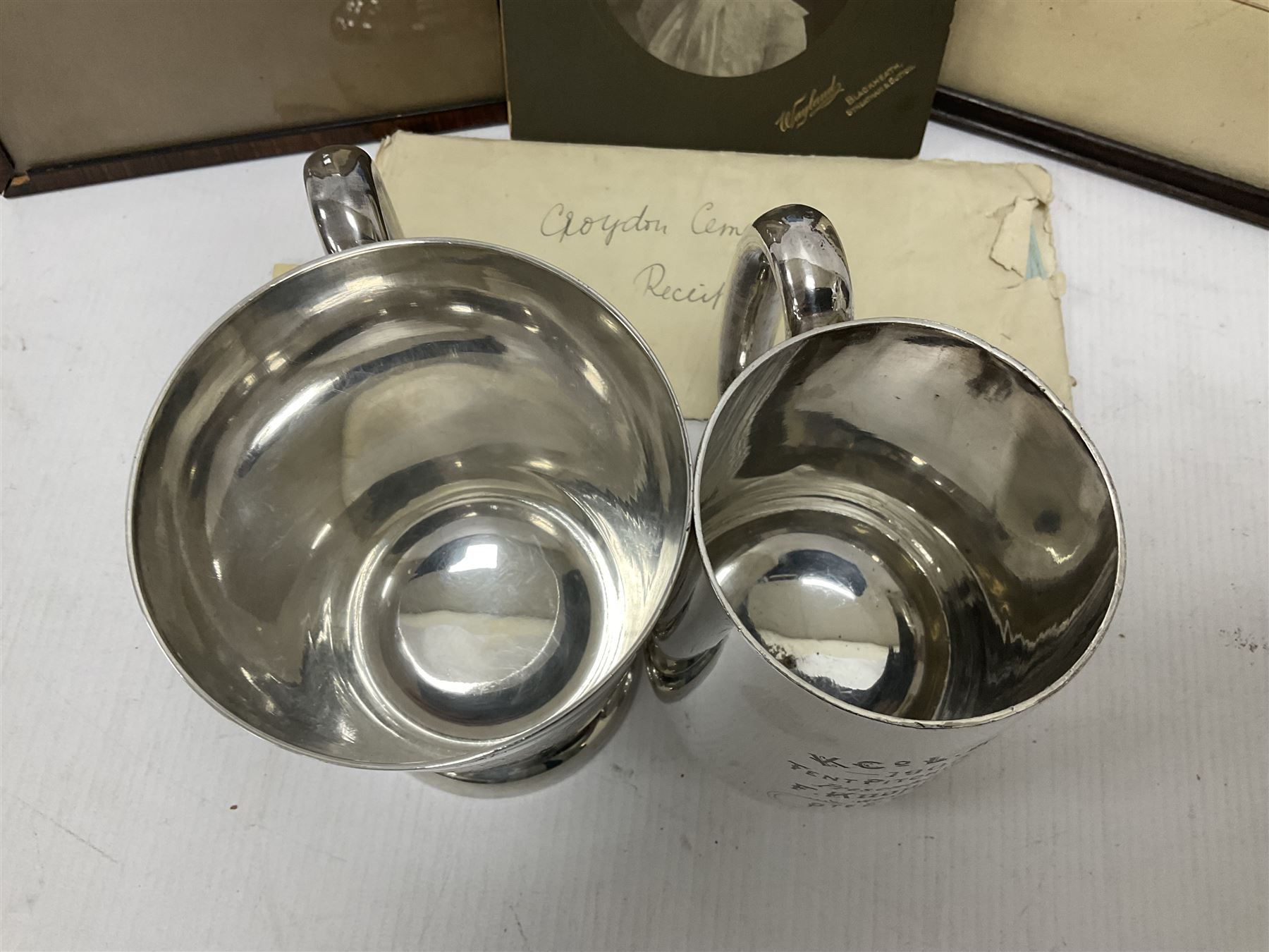 WWI bronze death plaque to Edwin Smith, together with two tankards presented to E.Smith and photographs of his family  