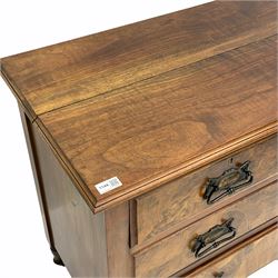 Edwardian figured walnut chest, fitted with two short and two long drawers