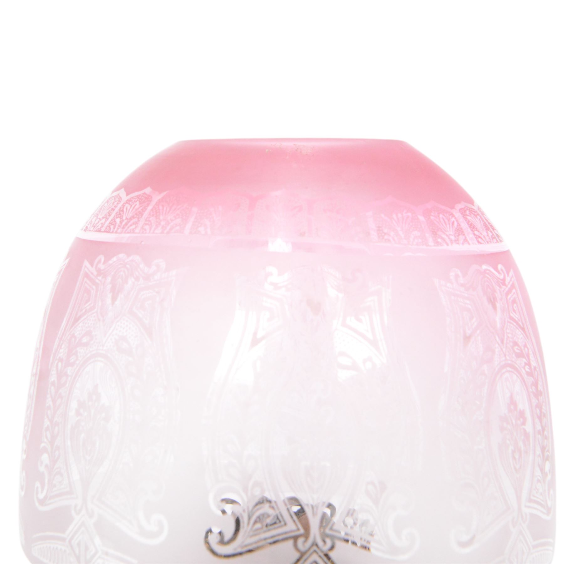 Victorian brass oil lamp, the Corinthian column supporting a cranberry glass burner and opaque etched cranberry glass shade and clear glass chimney, overall H77cm