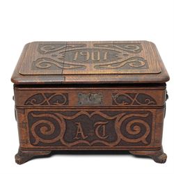 Arts & Crafts Design oak sewing box carved with initials and dated 1907, with sliding top,...