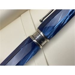 Montegrappa Emblema fountain pen, the blue pearl marbled barrel of octagonal form with silver mounts stamped 925 and silver mounted cap with 1912 emblem and clip with roller, in box, L13.5cm