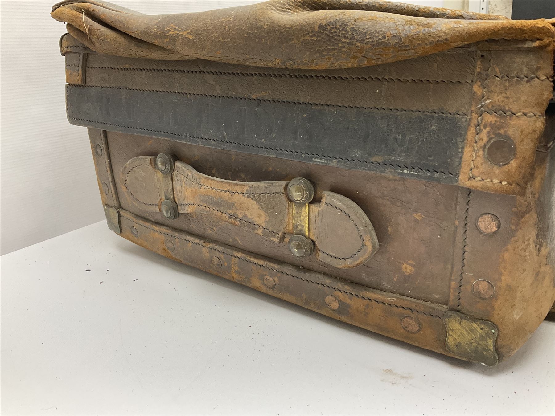 19th century leather suitcase, with brass plaque to cover engraved 'C R F Lutwidge Esq', the pink silk and white kid leather interior with pouch and edging impressed with gilt lettering reading 'By Appointment of Prince of Wales J W Allen 37 Strand Maker Prize Medal Awarded', H21cm, W73cm, Notes: Charles R. Fletcher Lutwidge, was mayor of Tunbridge Wells between 1895-1898, and again between 1901-1902