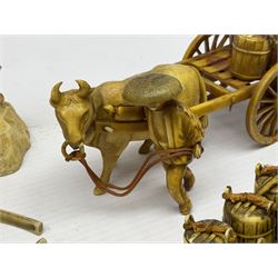 Collection of Japanese celluloid figures, including Rickshaw groups, fishing scene, oxen etc 
