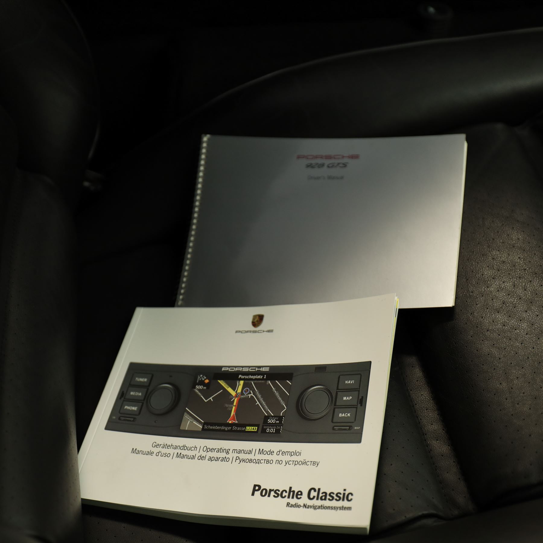 1991 Porsche 928 S4 Automatic Coupé

Registration: L644 LBE
Date of first registration as shown on V5: 1 July 1994
Porsche year of manufacture: 1991
Engine: 5.0-litre V8 petrol
Transmission: Automatic
Odometer reading: 37,886 kilometres (approximately 23,541 miles)
Colour: Slate Grey metallic
Interior: Black leather
V5C: Present
Keys: One
Chassis number: WP0ZZZ92ZMS800460

An exceptional Porsche 928 S4 Automatic Coupé finished in Slate Grey metallic with a black leather interior. The car displays a notably low odometer reading of just 37,886 kilometres, equivalent to approximately 23,541 miles.

The 928 S4 combined Porsche’s powerful 5.0-litre V8 engine with a sophisticated rear-mounted transaxle, creating a refined and accomplished grand tourer. This example is equipped with automatic transmission, electrically adjustable front seats, air conditioning, alloy wheels and the characteristic rear spoiler.

The car was purchased from Specialist Cars of Malton in June 2019, at which time the recorded mileage was 36,650 kilometres. The accompanying service record includes evidence of a cam belt replacement.

Presented in excellent condition throughout, the bodywork and metallic paint finish appear particularly well preserved, while the cabin retains its original character with black leather upholstery and 928-branded sill trims. A Japanese Porsche service label records maintenance entries at 31,902, 33,397 and 34,134 kilometres.

The car also features a Porsche Classic Communications Management (PCCM) upgrade system.

Features

• 5.0-litre V8 petrol engine
• Automatic transmission
• Slate Grey metallic paintwork
• Black leather interior
• Electrically adjustable front seats
• Air conditioning
• Porsche alloy wheels
• Rear spoiler
• Right-hand drive
• Odometer reading of 37,886 kilometres, approximately 23,541 miles
• Purchased from Specialist Cars of Malton in June 2019
• Recorded at 36,650 kilometres when purchased
• Service record showing cam belt replacement
• Japanese Porsche service label
• V5C present
• One key

This vehicle forms part of the Estate of the Late John Sils and is offered for sale by the Executors, confirming a genuine reason for sale.