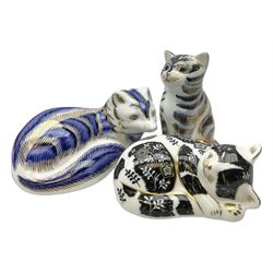Three Royal Crown Derby paperweights, comprising Misty, exclusive to the RCD Collectors Guild during 2003, Grey Kitten, modelled as a sitting cat, with original box, and Platinum Arctic Fox, all with gold stoppers, and further associated box, tallest H8cm