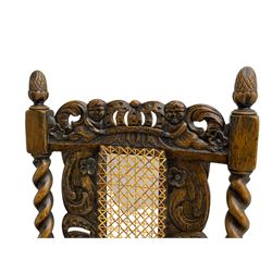 Set six 19th century oak Carolean style dining chairs, the cresting rail with open crown flanked by putto, spiral turned uprights with pineapple finials, canework seat and back, the seat rails carved with foliage, spiral turned supports joined by s-scroll and open crown carved front rail, decorated with flower heads, each with upholstered seat pad