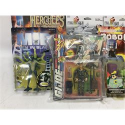 Twenty-three carded action figures including Fantasy VIII (6), Hercules (3), MIB (2), Robocop (2), The Golden Compass, The Incredibles (3), Wallace & Gromit (3), Robotech (2) and GI Joe; all in unopened blister packs (23)