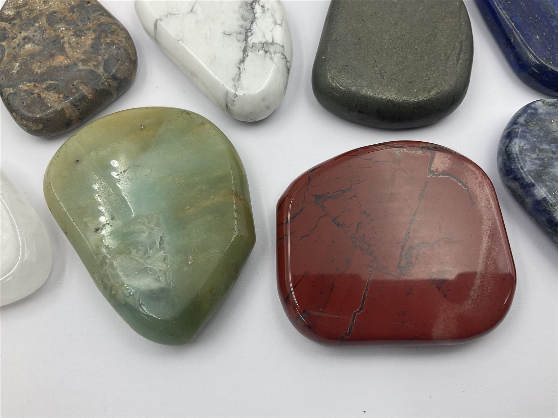 Fifteen mineral specimens, each cut and polished to highlight natural formations, including lapis lazuli, rose quartz, green aventurine, jasper, black obsidian etc, L4cm