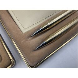 Group of five rolled gold Cross pens and propelling pencils, to include a fountain pen with gold nib stamped 14K 585, pencil and pen set with pouch, etc, all with boxes (5)