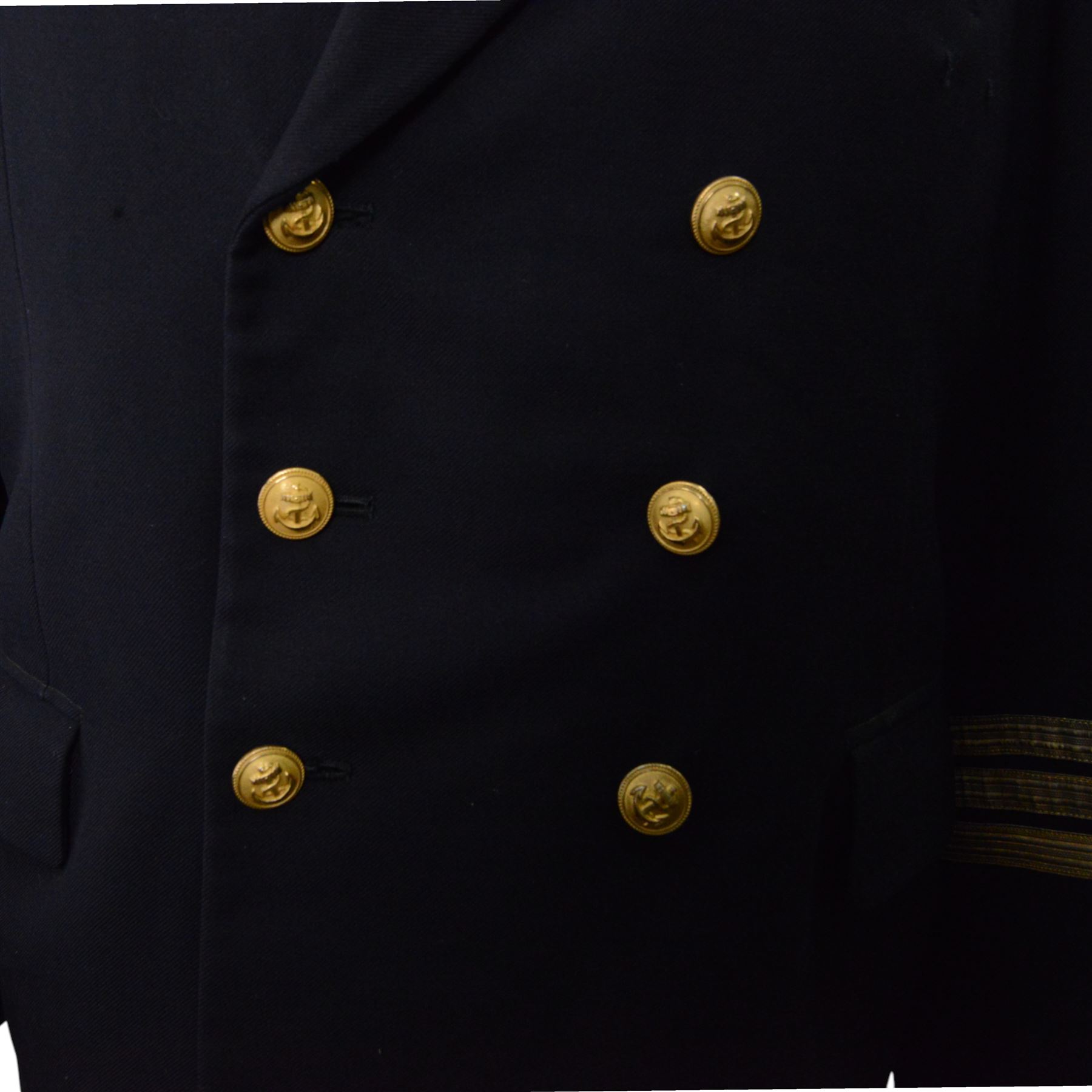 German World War II Kreigsmarine navy blue jacket by Ernst Brendler, Hamburg, with ribbon band, National Emblem and  anchor brass buttons