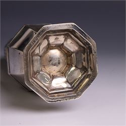 Edwardian silver sugar caster, of typical for with removable pierced cover and upon octagonal foot, hallmarked Mappin & Webb Ltd, Sheffield 1906, H21cm