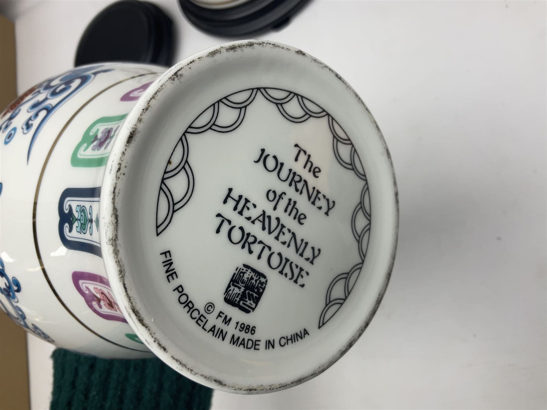 Franklin Mint Chinese style ceramics, comprising two vases, puppy and a planter, all on wooden stands