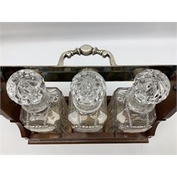 Edwardian silver plate mounted oak tantalus, containing three square sided cut glass decanters, complete with key, H33cm