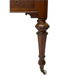 Victorian figured mahogany two-piece bedroom set - the washstand with white and black marble moulded top with arched back and raised shelf, two moulded frieze drawers, on turned and fluted supports with brass and ceramic castors (W123cm, D60cm, H102cm); the dressing table with raised swing mirror in moulded frame with shell and scroll carved pediment, on scrolled horns carved with foliage, four raised trinket drawers over moulded rectangular top, fitted with two drawers, on turned and fluted supports with brass and ceramic castors (W122cm, H177cm, D62cm)