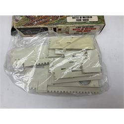 Three unmade construction kits - Airfix 1:24 scale Supermarine Spitfire Mk.1A; predominantly in unopened factory packaging with instructions and decal sheet; Frog Shell Welder with instructions; and Airfix Battle of Waterloo Farmhouse (instructions on box base); all boxed (3)