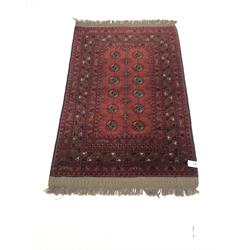 Persian style red ground rug,  patterned field, repeating border, 135cm x 86cm