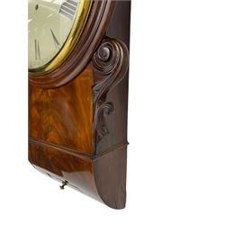 English 8-day mahogany single train fusee wall clock, with a four-pillar movement, 12” dial and cast brass bezel, circular mahogany bezel, carved earpieces and curved base with pendulum adjustment door, unsigned painted dial with Roman numerals, minute track and steel spade hands.  With pendulum.