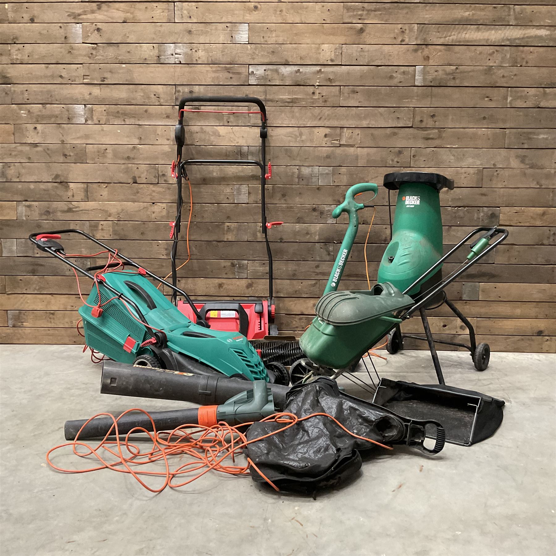 A Bosch Rotak 34R lawn mower, a Bergman Pro 3in1 Scarficer, Rake & Sweeper, a Black &Decker GS1800 chipper, a strimmer and a blower